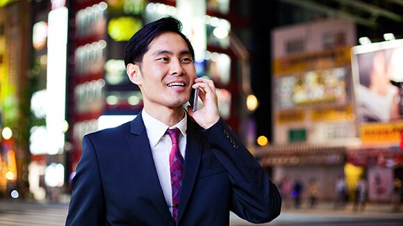 asian-male-on-cellphone