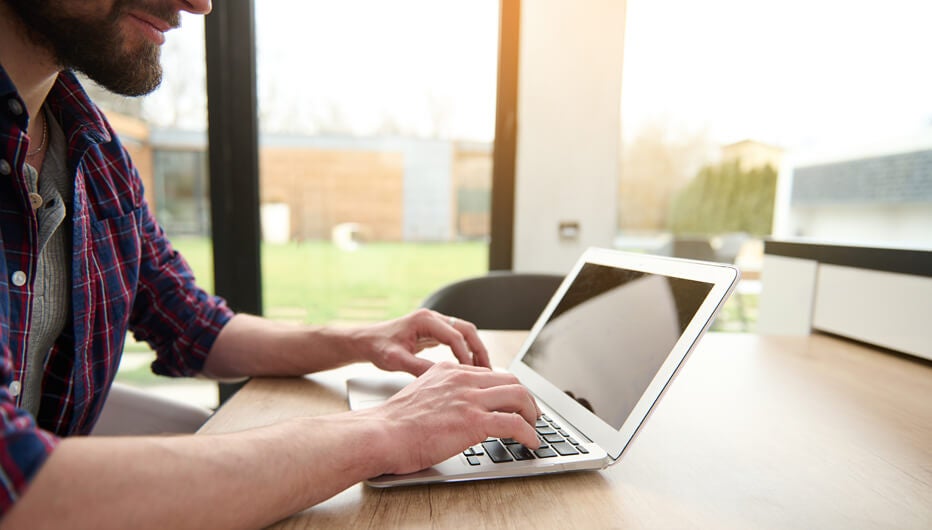 man working on laptop